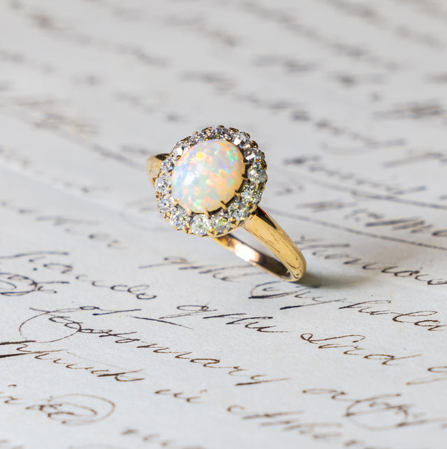 Antique, Edwardian white opal and diamond cluster ring side