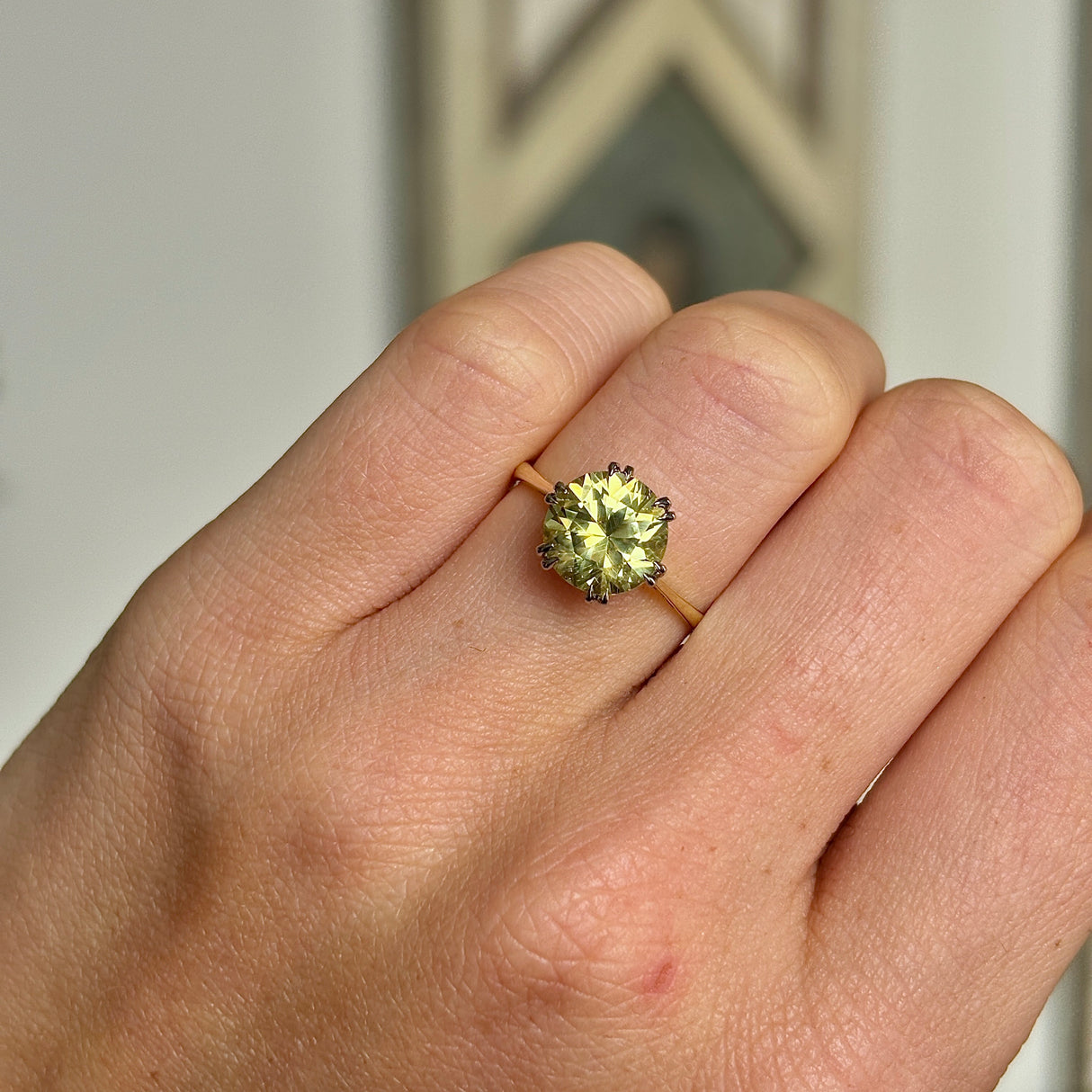 Vintage, 1980s single-stone chrysoberyl ring worn on hand