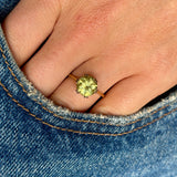 Vintage, 1980s single-stone chrysoberyl ring worn on hand.