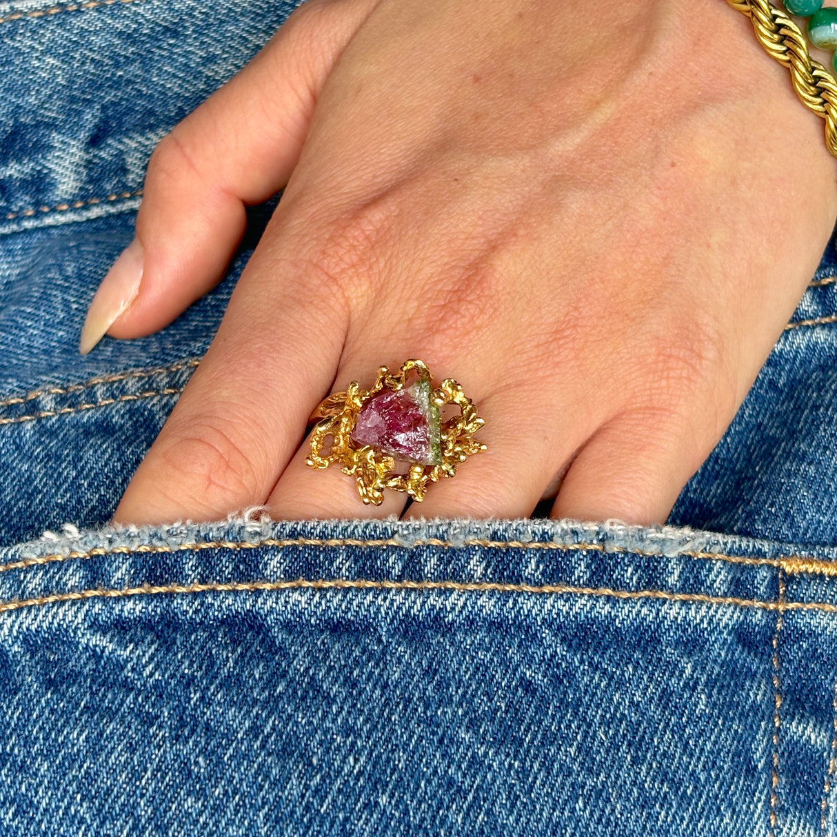 Vintage, 1970s watermelon tourmaline cocktail ring worn on hand.