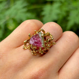 Vintage, 1970s watermelon tourmaline cocktail ring worn on hand.