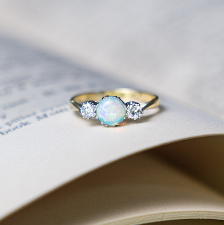 Antique, Edwardian opal and diamond three-stone ring front