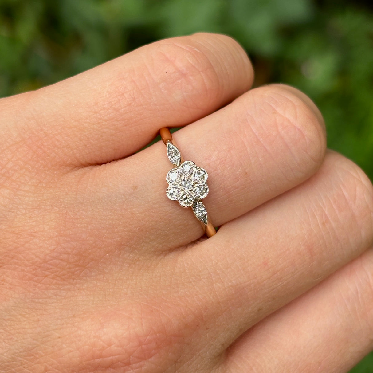 Antique, Edwardian diamond engagement ring worn on hand