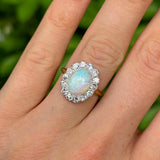 Antique, Edwardian opal & diamond cluster worn on hand.