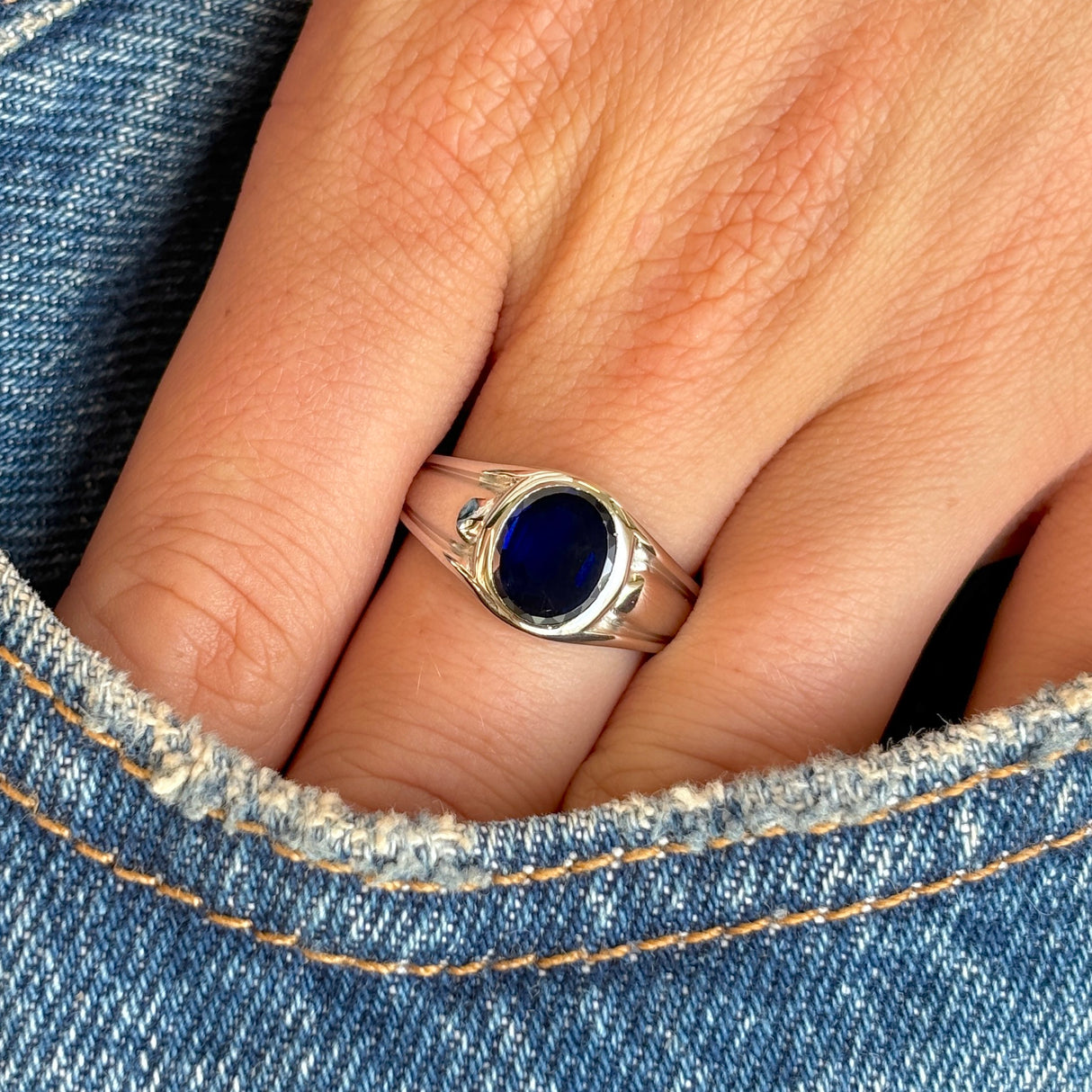 Vintage, Tiffany & Co. single-stone sapphire ring worn on hand