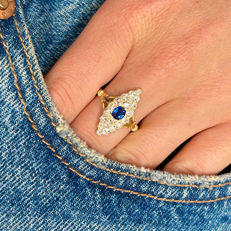 1877-Antique, Victorian sapphire & diamond navette cluster ring on hand.