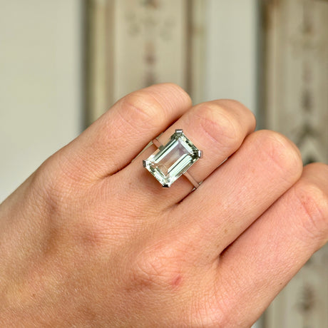 1879-Vintage, aquamarine single-stone ring worn on hand.