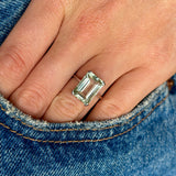 1879-Vintage, aquamarine single-stone ring worn on hand.