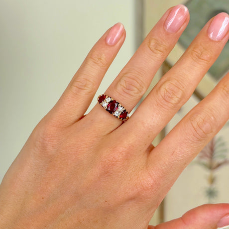 1952-Antique, Victorian garnet & diamond three-stone ring- worn on hand.