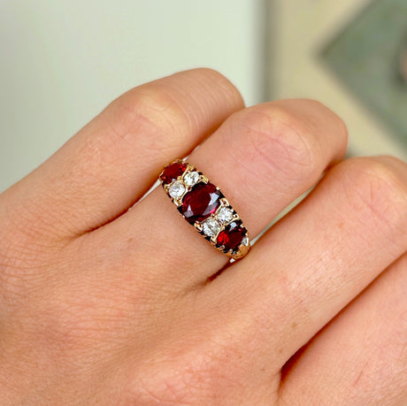 1952-Antique, Victorian garnet & diamond three-stone ring- worn on hand