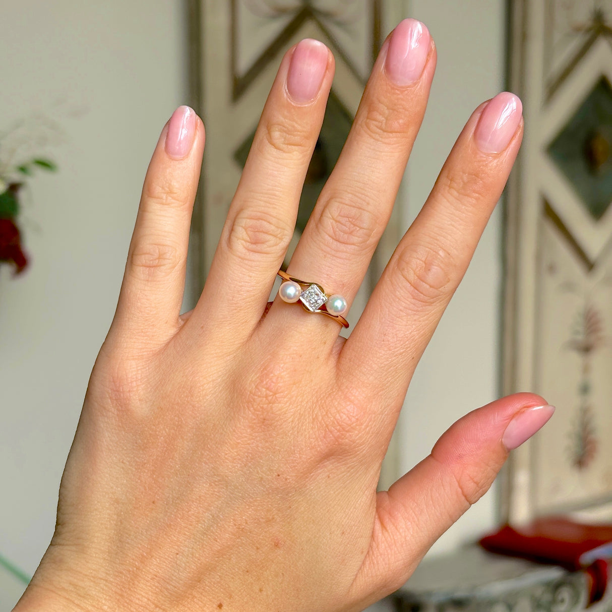 1993-Antique, Edwardian pearl & diamond three-stone ring worn on hand.