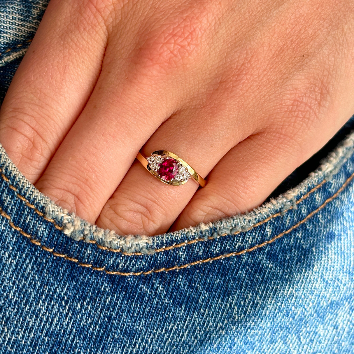 Antique, Edwardian ruby & diamond twist ring worn on hand