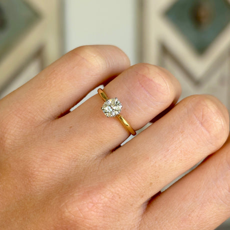 Vintage, old cushion-oval cut solitaire diamond ring