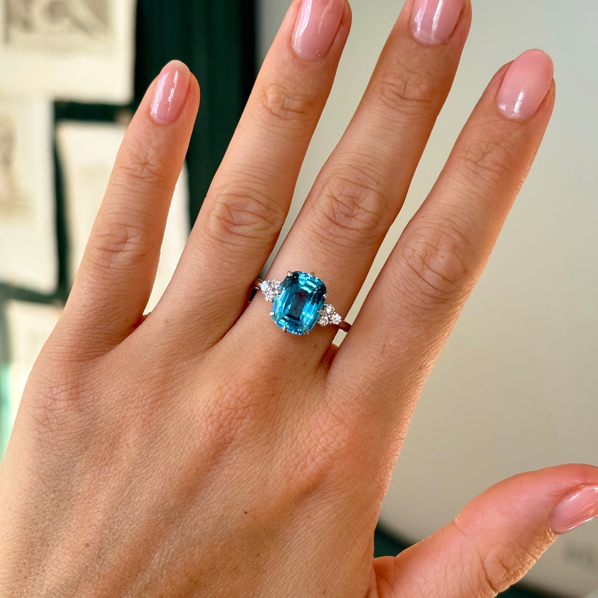 Vintage, 1970s blue topaz & diamond ring worn on hand.