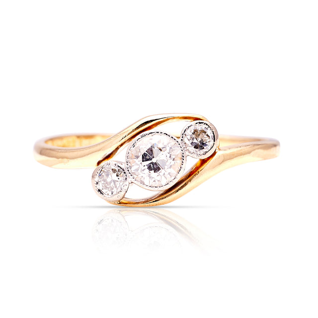 Antique, Edwardian three-stone diamond twist ring, 18ct yellow gold front