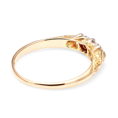 Antique, Edwardian three-stone diamond ring, 18ct yellow gold back