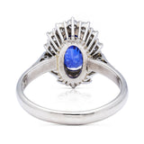 Sri lankan sapphire and diamond cluster engagement ring, 18ct white gold