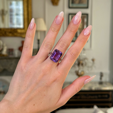 Vintage, Art Deco amethyst cocktail ring worn on hand. 