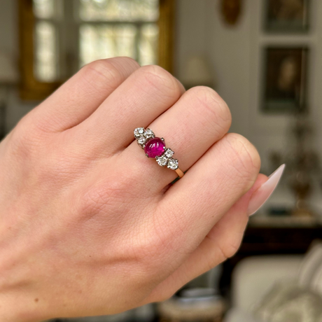 Antique, Edwardian Cabochon Ruby and Diamond Ring, worn on closed hand.