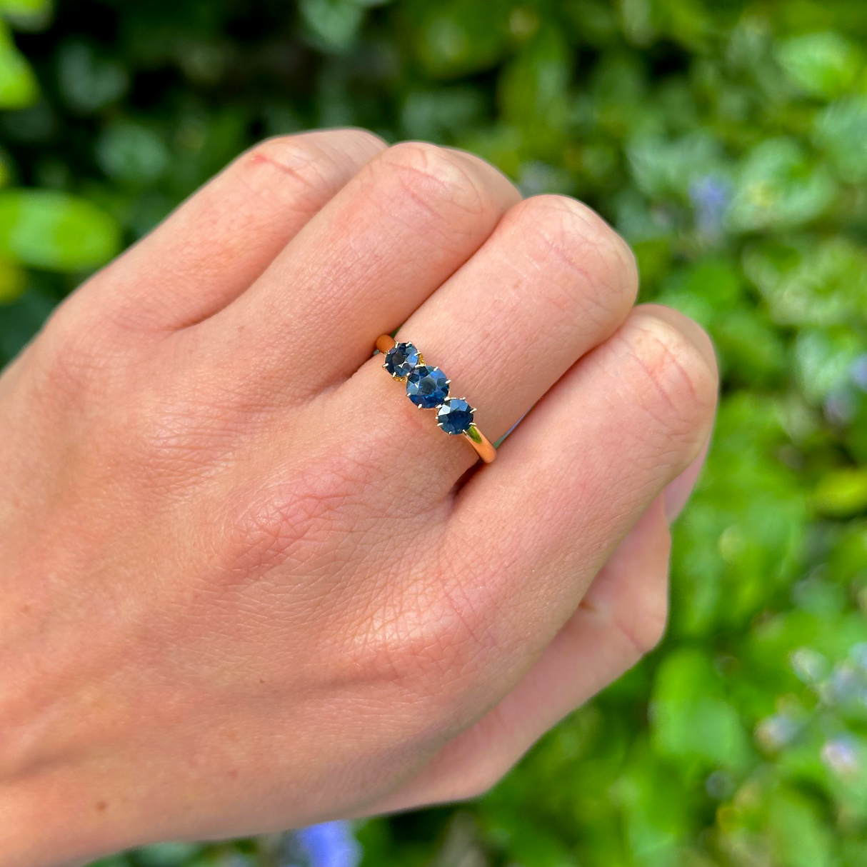 Antique, Edwardian Sapphire Three-Stone Ring, 18ct Yellow Gold worn on hand.