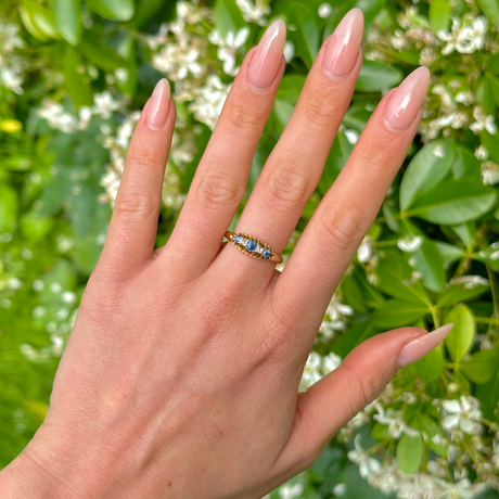 Antique, Edwardian Sapphire and Diamond Five-Stone Ring, 18ct Yellow Gold worn on hand.