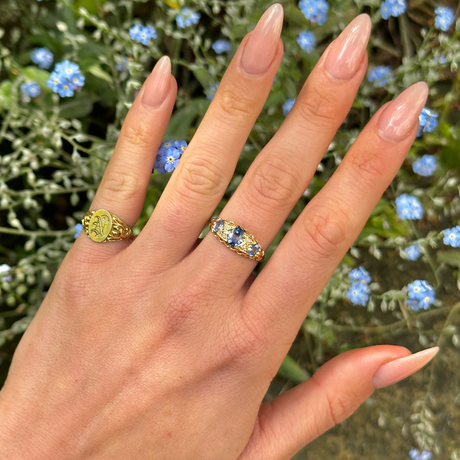 Antique, Edwardian Sapphire and Diamond Three-Stone Engagement Ring, 18ct Yellow Gold worn on hand.