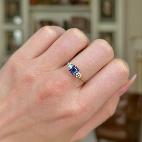 Antique, Edwardian Sapphire and Diamond Three-Stone Engagement Ring, 18ct Yellow Gold and Platinum worn on closed hand.