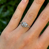 Antique, Edwardian diamond cluster engagement ring & Platinum worn on hand