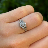 Antique, Edwardian diamond cluster engagement ring & Platinum worn on hand