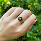 Antique, Victorian garnet cluster ring, 18ct yellow gold on hand.