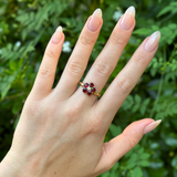 Antique, Victorian garnet cluster ring, 18ct yellow gold on hand.