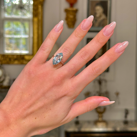 vintage marquise cut aquamarine ring, worn on hand, front view. 