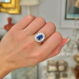 2.5ct oval blue sapphire and diamond cluster ring, 18ct white gold