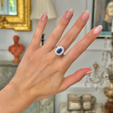 2.5ct oval blue sapphire and diamond cluster ring, 18ct white gold