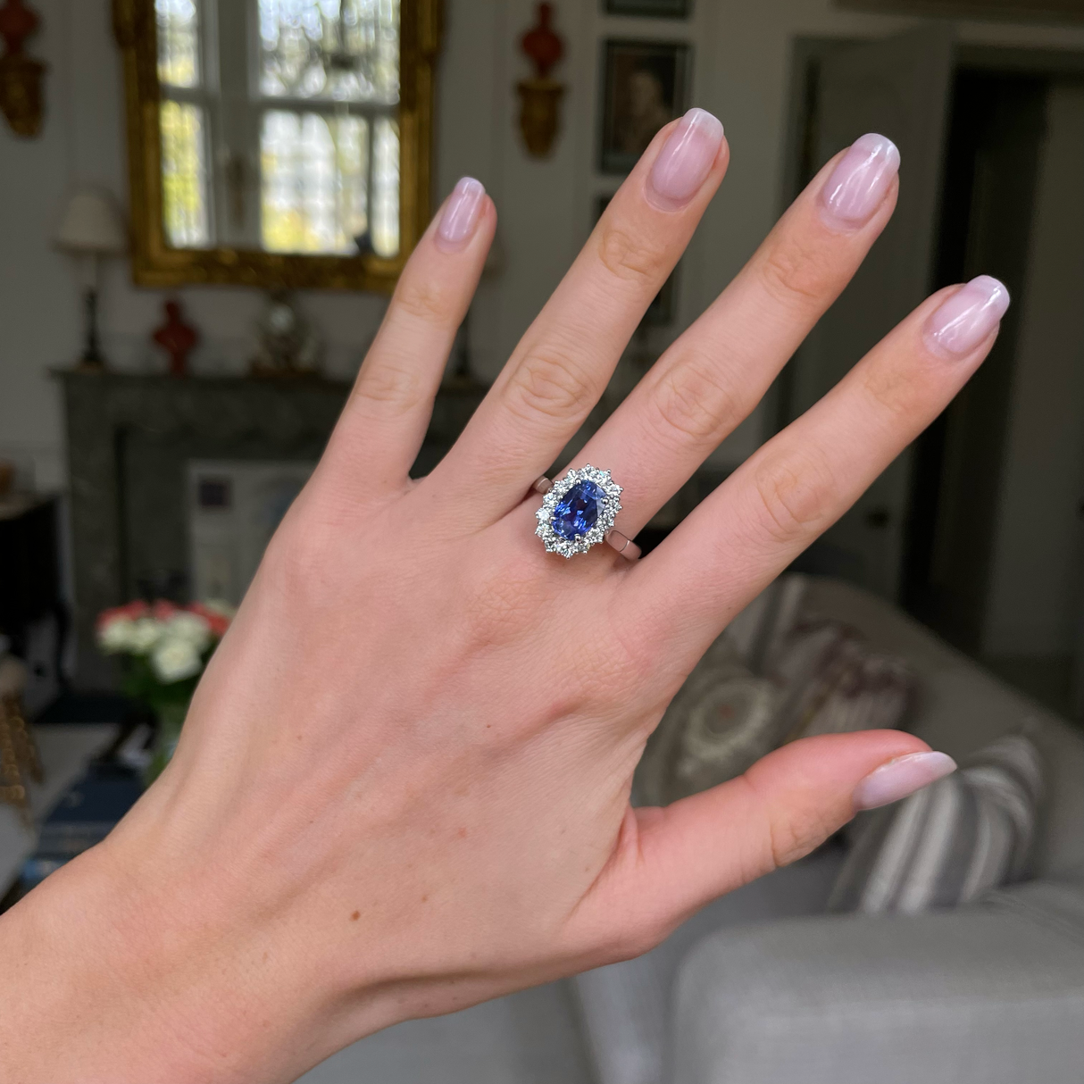 Sri lankan sapphire and diamond cluster engagement ring, 18ct white gold