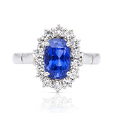 Sri lankan sapphire and diamond cluster engagement ring, 18ct white gold