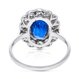 2.5ct oval blue sapphire and diamond cluster ring, 18ct white gold