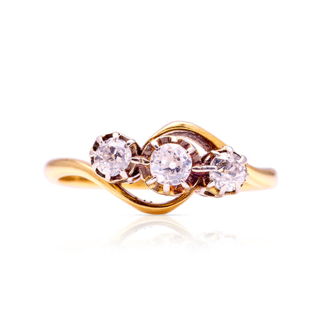 Vintage, Art Deco three-stone diamond twist ring, 18ct yellow gold & platinum front