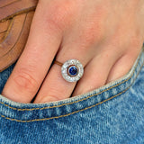 Vintage, 1930s sapphire and diamond target engagement ring on hand