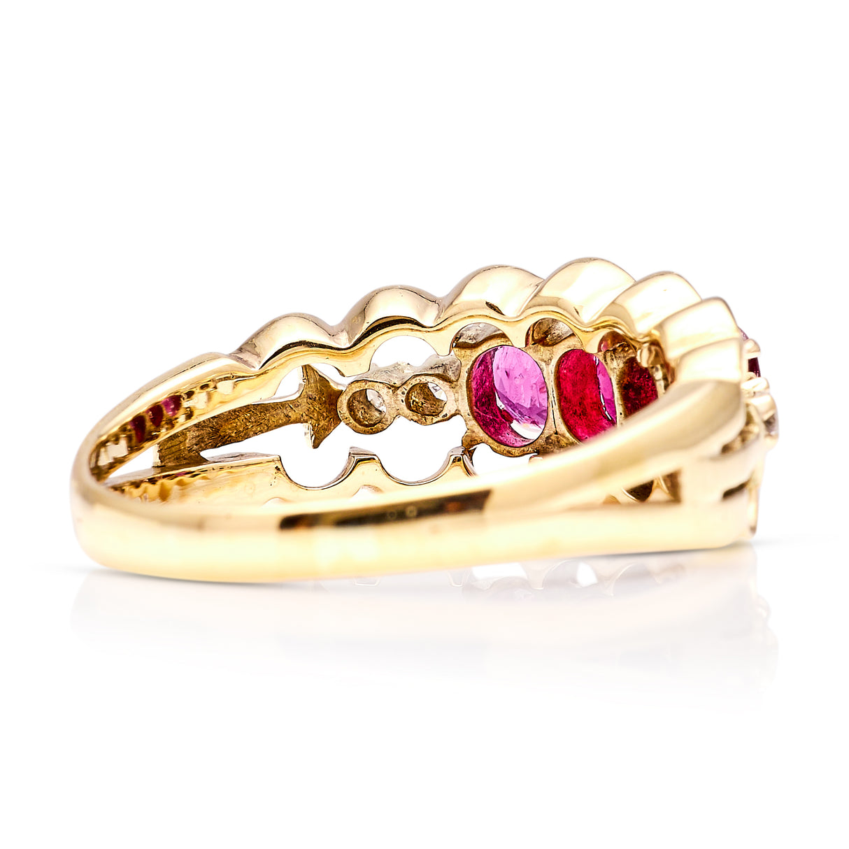 Vintage, 1980s ruby and diamond three-stone ring back