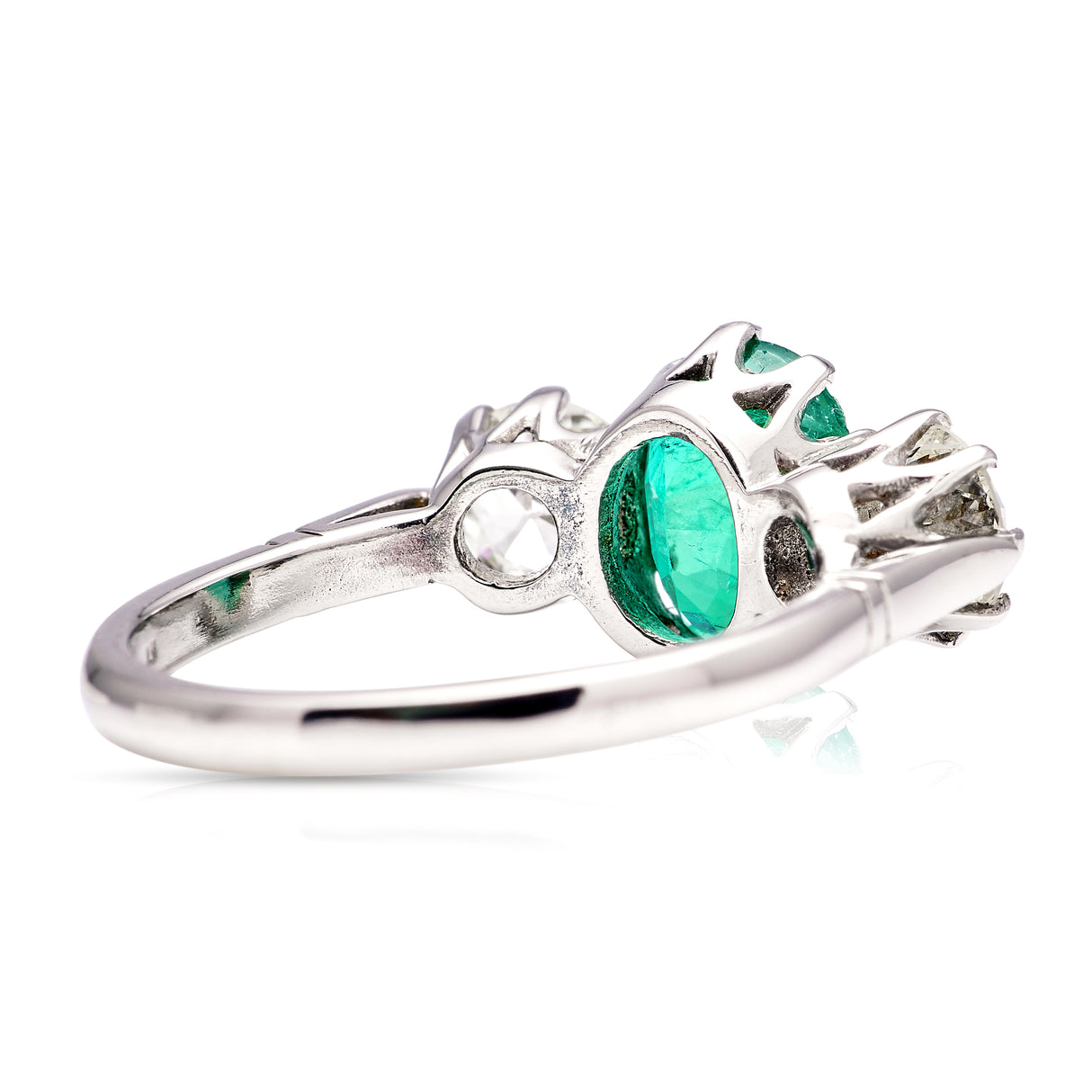 Vintage, emerald and diamond three-stone ring