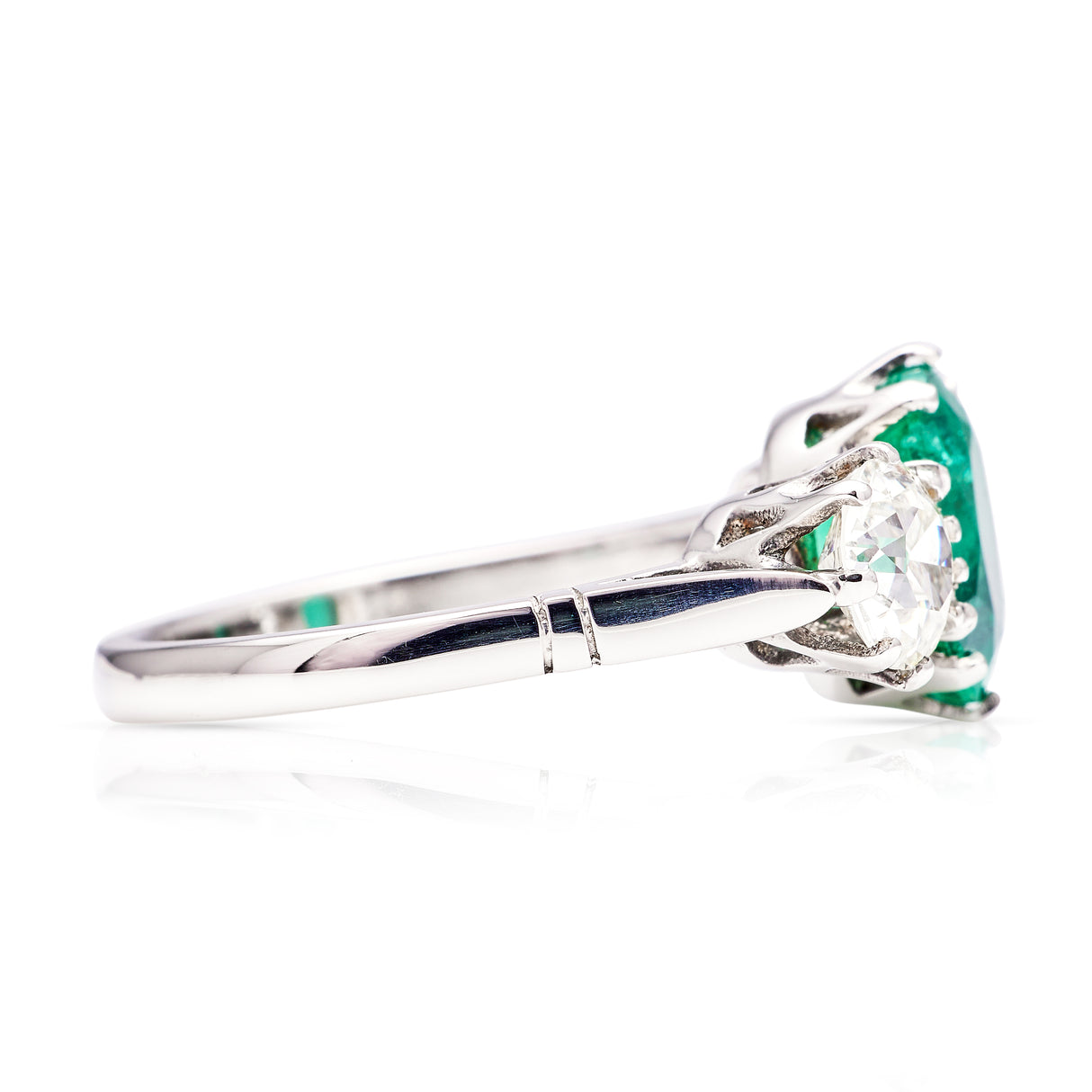 Vintage, emerald and diamond three-stone ring