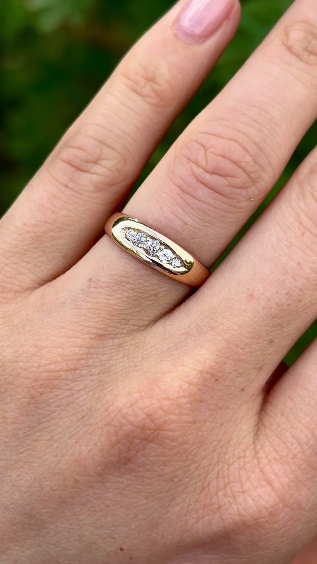 Antique, Edwardian five-stone diamond ring worn on hand