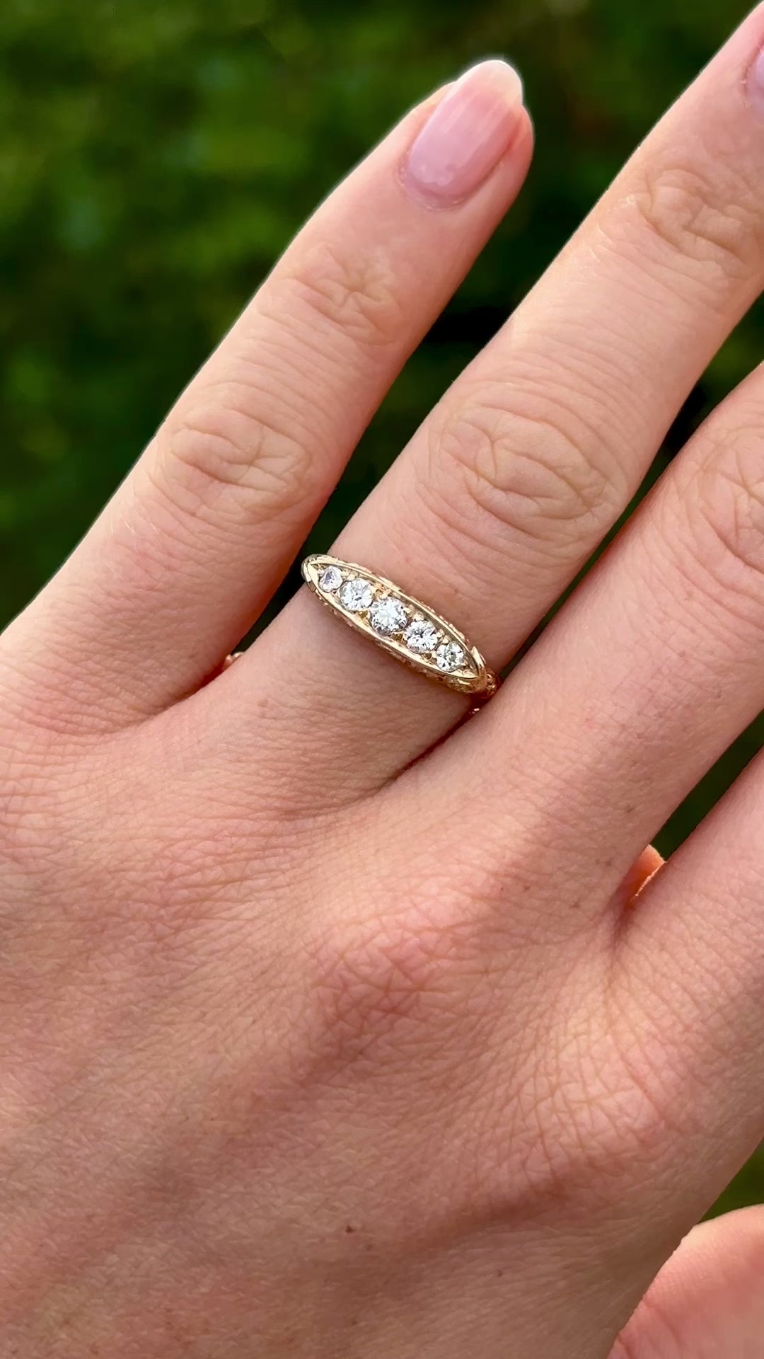 Antique, Edwardian five-stone diamond ring front worn on hand