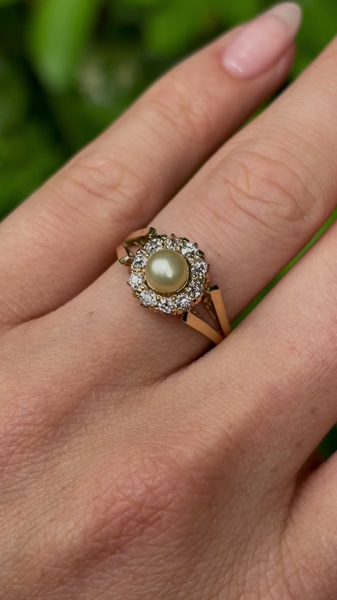 Vintage, 1980s pearl & diamond cluster ring worn on hand.