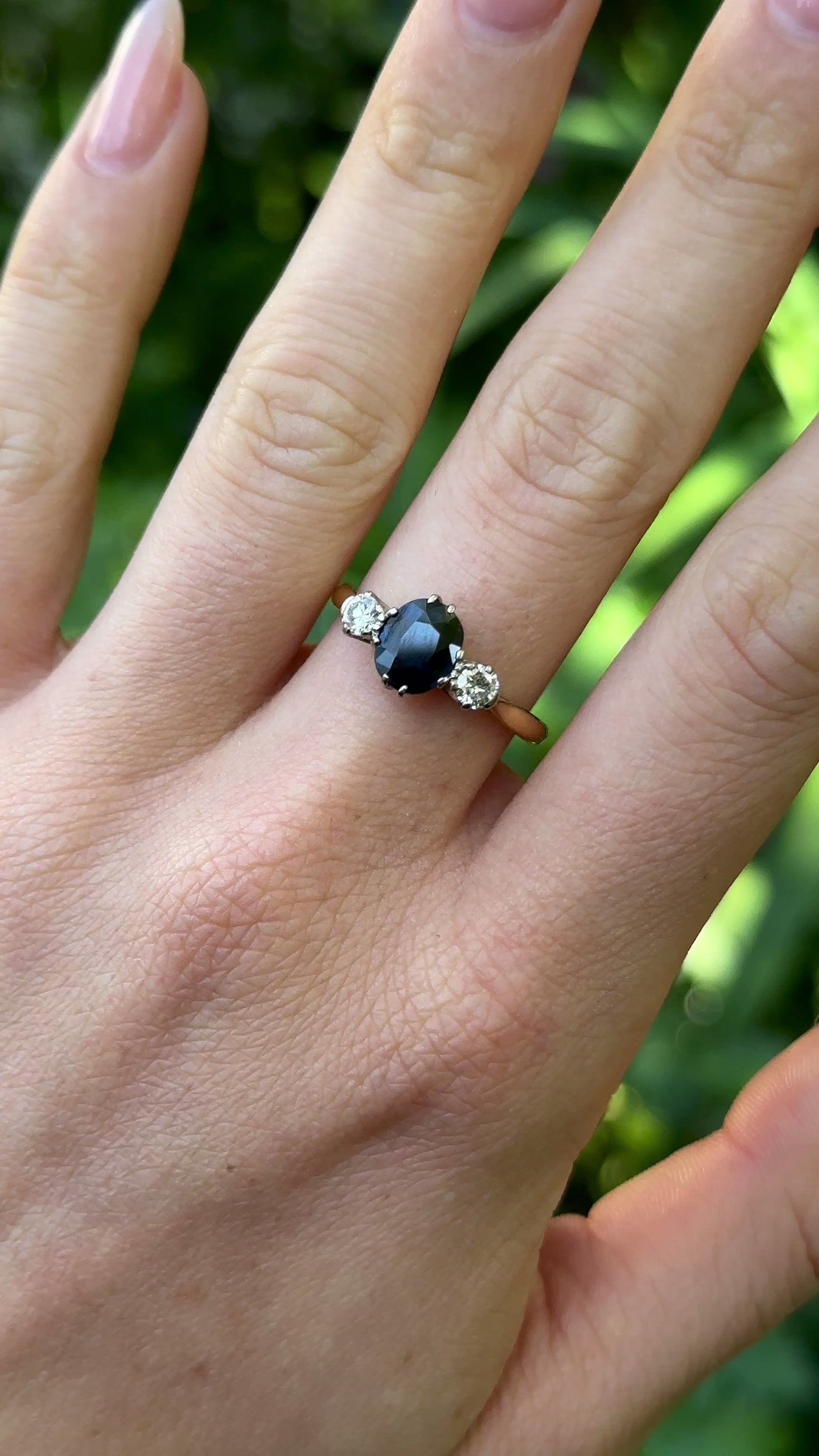 Vintage, Art Deco Sapphire and Diamond Three-Stone Ring, 18ct Yellow Gold and Platinum worn on hand.