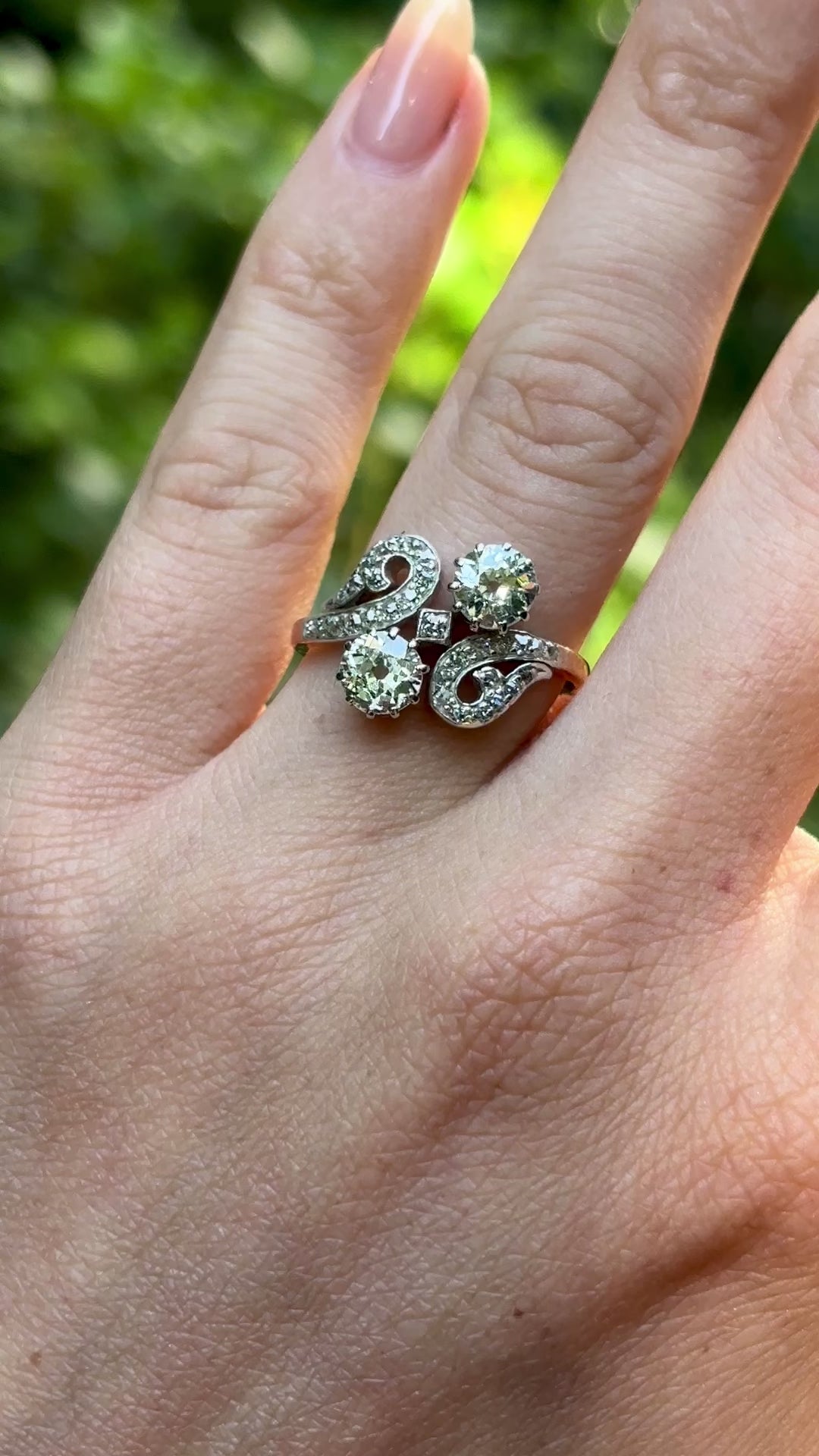 Antique, Art Nouveau diamond ring worn on hand