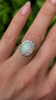 Antique, Edwardian opal & diamond cluster worn on hand.