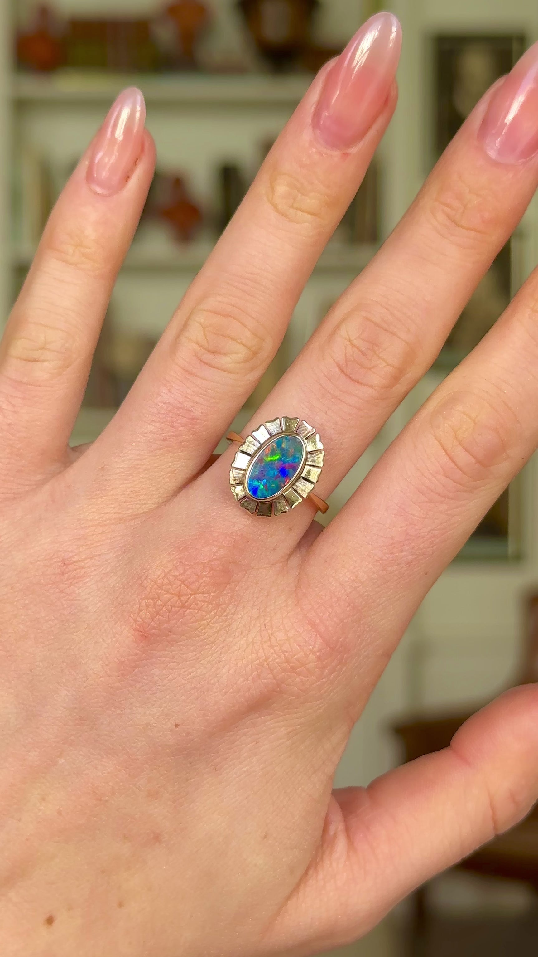 Vintage, 1980s Black Opal Ring, 9ct Yellow Gold worn on hand and rotated to give perspective.