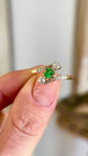 Antique, Edwardian emerald & diamond three-stone diamond ring